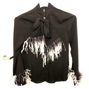 Feather trim tie neck blouse